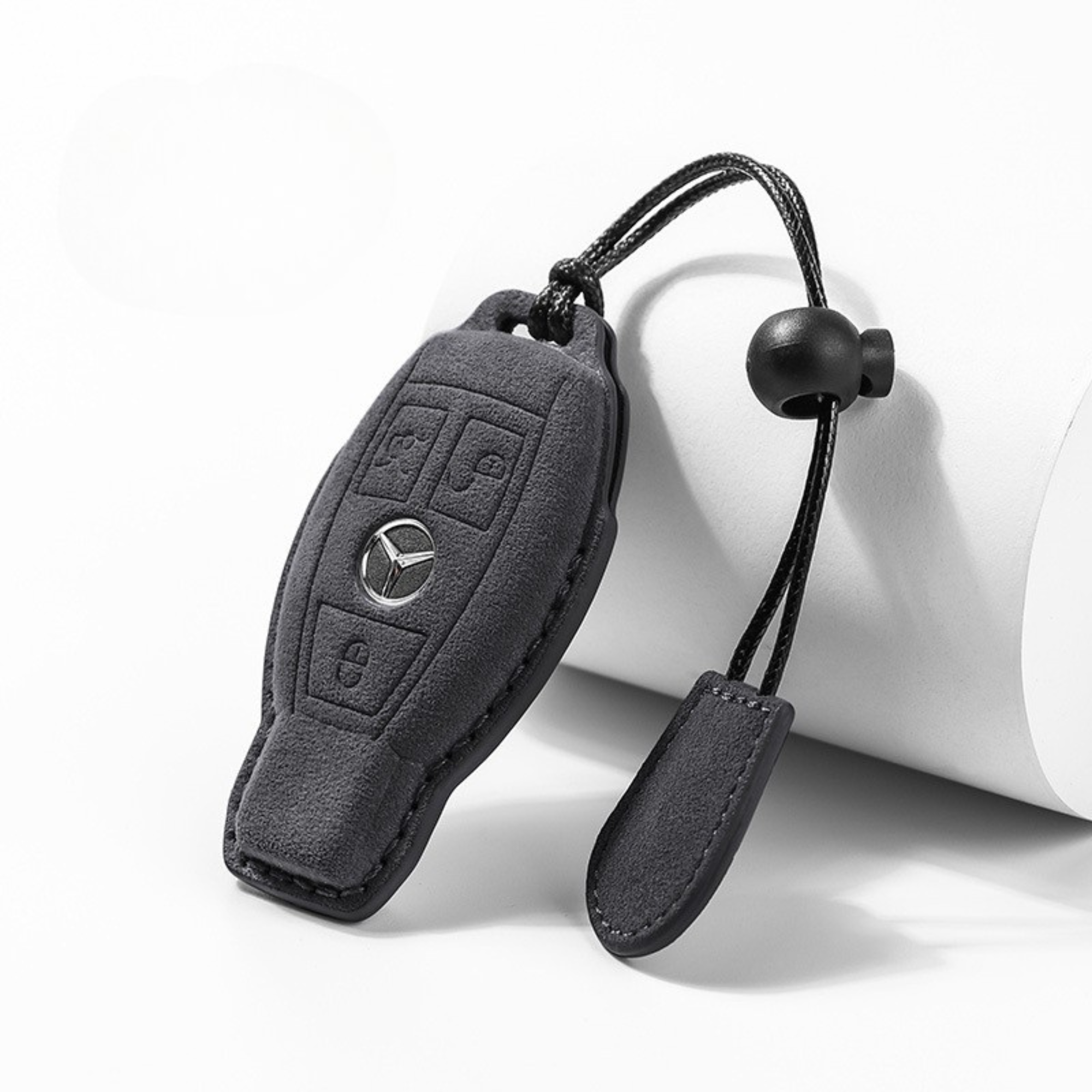 Dark grey suede Mercedes key case with metal keyring