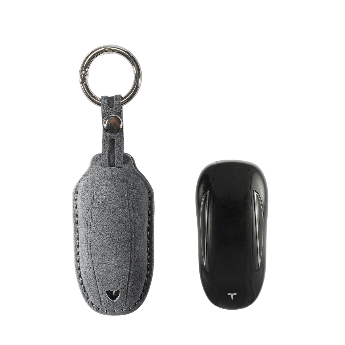 Tesla key fob cover shown with key, Alcantara suede
