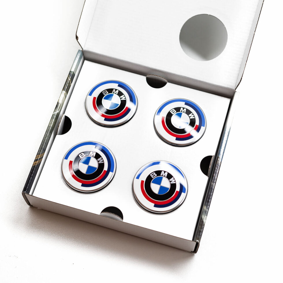 BMW 50 Year M center caps in original packaging – 56mm set of 4

