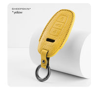 Audi sheepskin key fob cover in yellow
