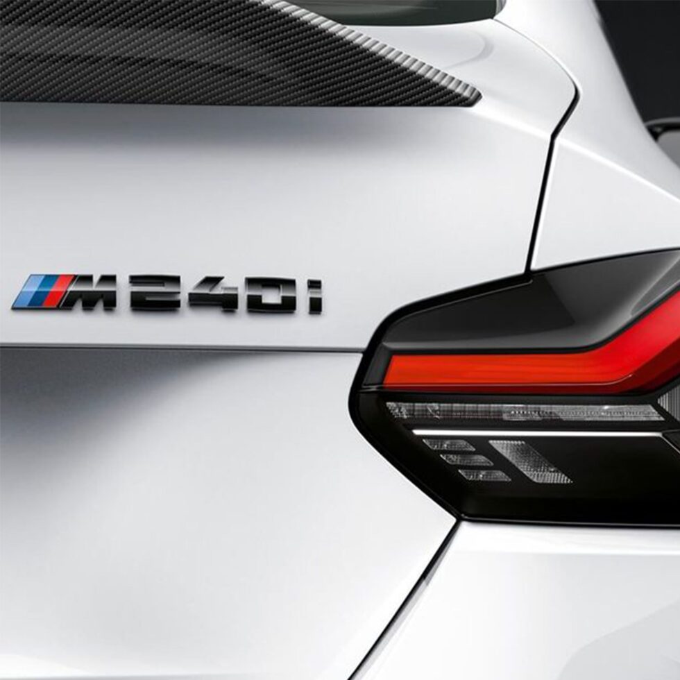Installed gloss black BMW M240 badge on rear trunk – OEM look

