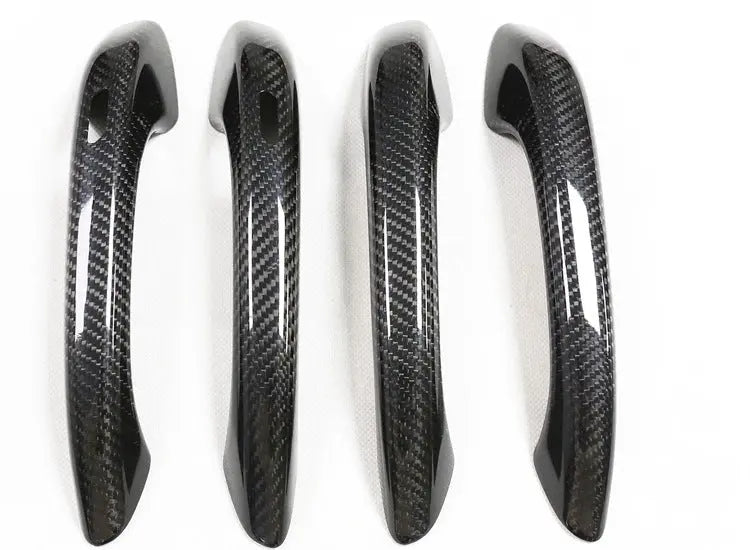 Porsche carbon fiber door handle covers, close-up of the weave, view 2