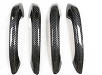Porsche carbon fiber door handle covers, close-up of the weave, view 2