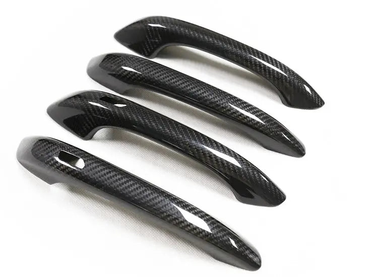 Porsche carbon fiber door handle covers, close-up of the weave, view 3