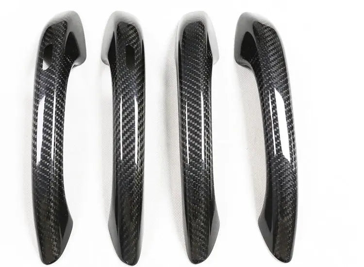 Porsche carbon fiber door handle covers, close-up of the weave, view 5