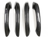 Porsche carbon fiber door handle covers, close-up of the weave, view 5