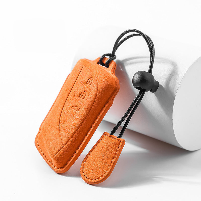 Pair of Lexus smart key covers in orange suede finish