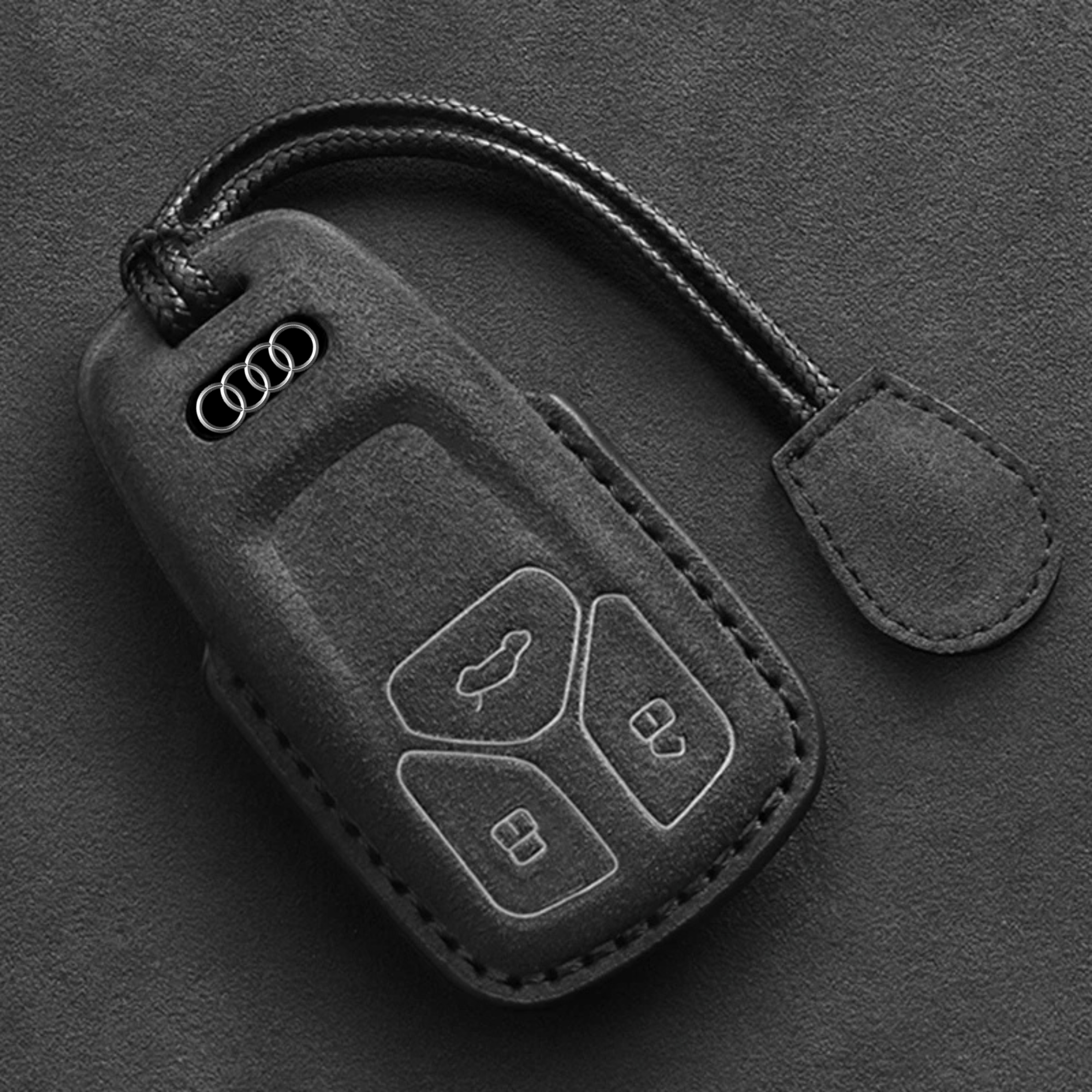 Audi Alcantara key cover with premium suede texture, offering a sleek and stylish design for key fob protection