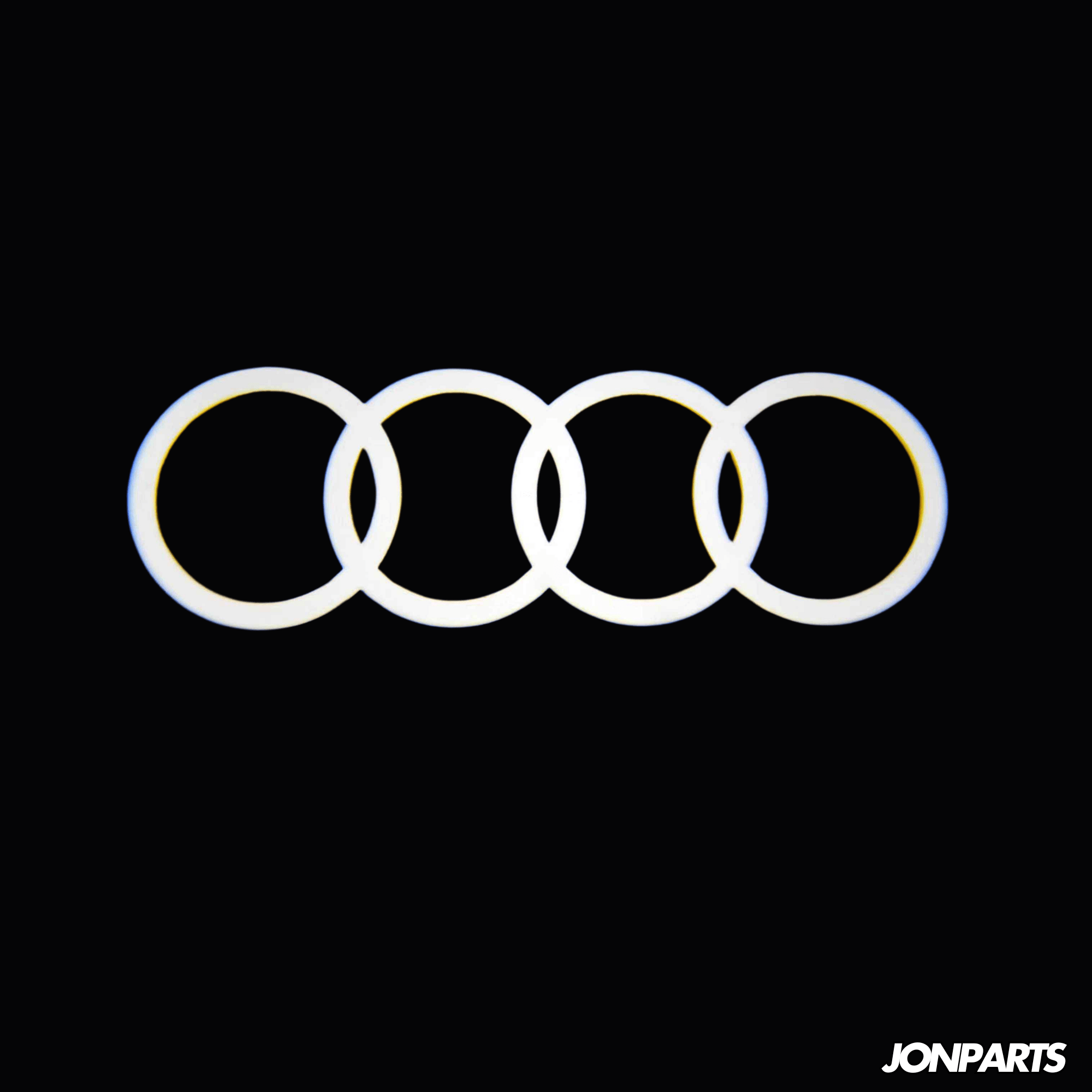 Audi LED door projector light displaying the iconic four rings logo on the ground, creating a stylish and premium entry experience.