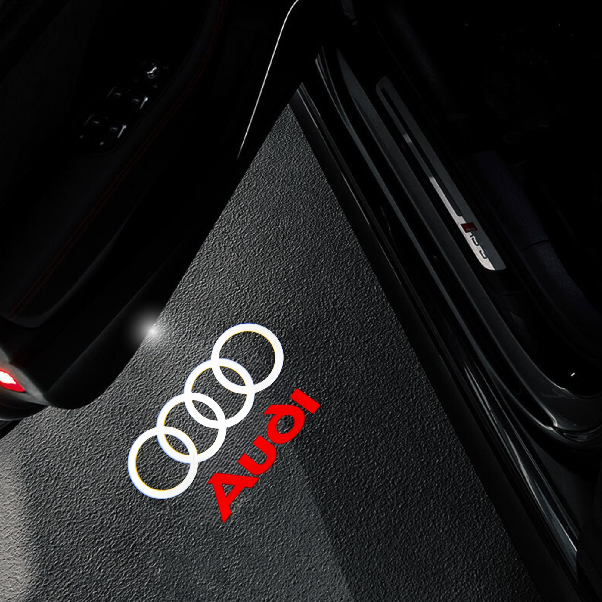 Audi LED door projector light displaying the iconic four rings logo on the ground, creating a stylish and premium entry experience.