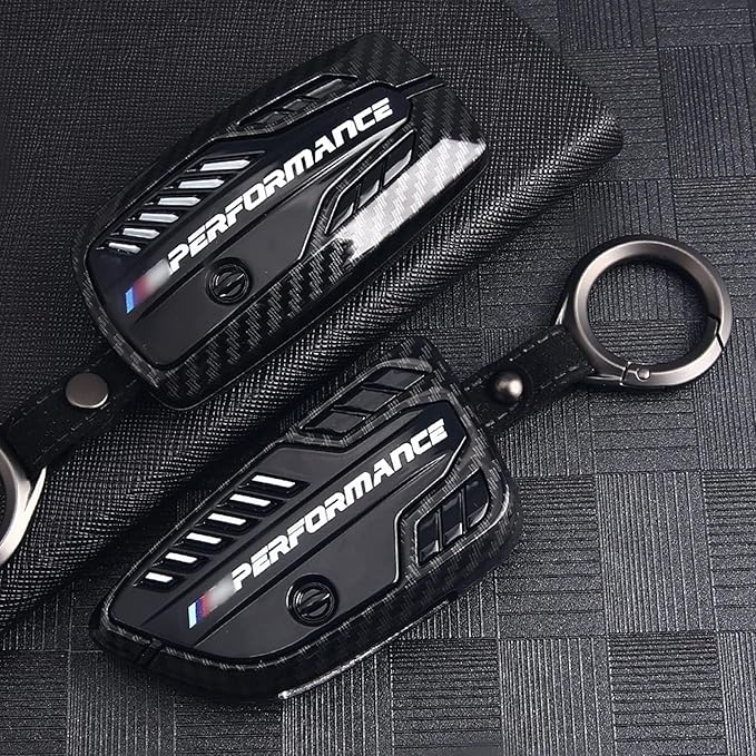 BMW M Performance carbon fiber key cover with a sleek, high-gloss finish and durable construction, offering premium protection and luxury styling.