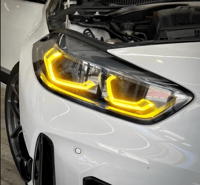 BMW F80 M3 with CSL Yellow DRL LED lights, transforming the look of the headlights with a bold yellow hue