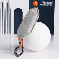 Volkswagen Alcantara suede key fob cover in light grey (orange stitching)