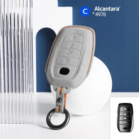 Toyota Alcantara suede key fob cover in light grey (orange stitching)
