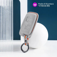 Toyota Alcantara suede key fob cover in light grey (orange stitching)