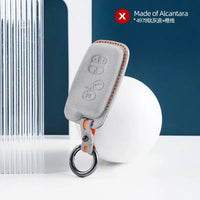 Toyota Alcantara suede key fob cover in light grey (orange stitching)