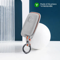 Toyota Alcantara suede key fob cover in light grey (orange stitching)