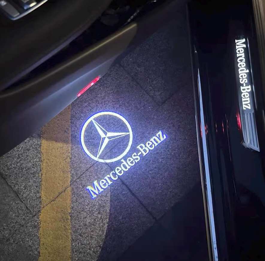 Mercedes-Benz LED door logo projector light displaying the classic Mercedes benz logo on the ground, enhancing vehicle entry with a premium illuminated effect.