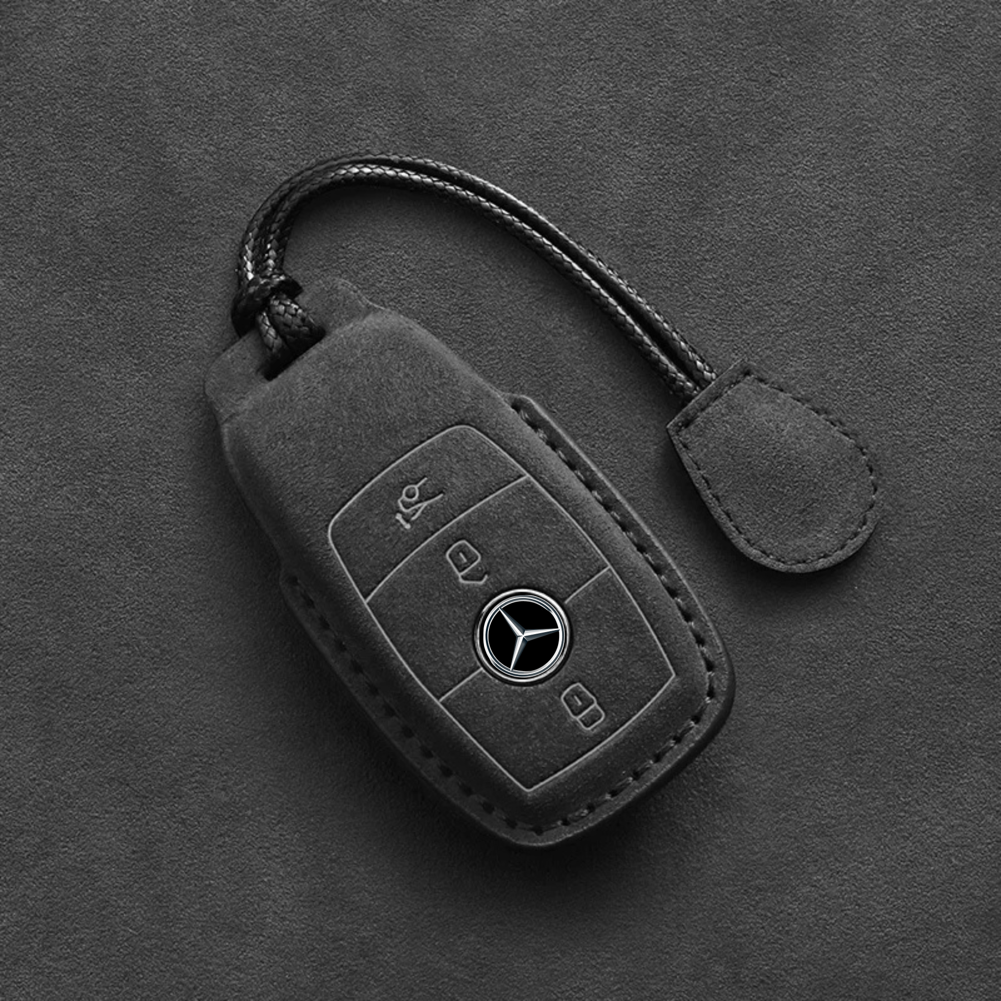 Mercedes-Benz Alcantara key cover with luxury suede finish, providing a premium feel and secure fit for the key fob