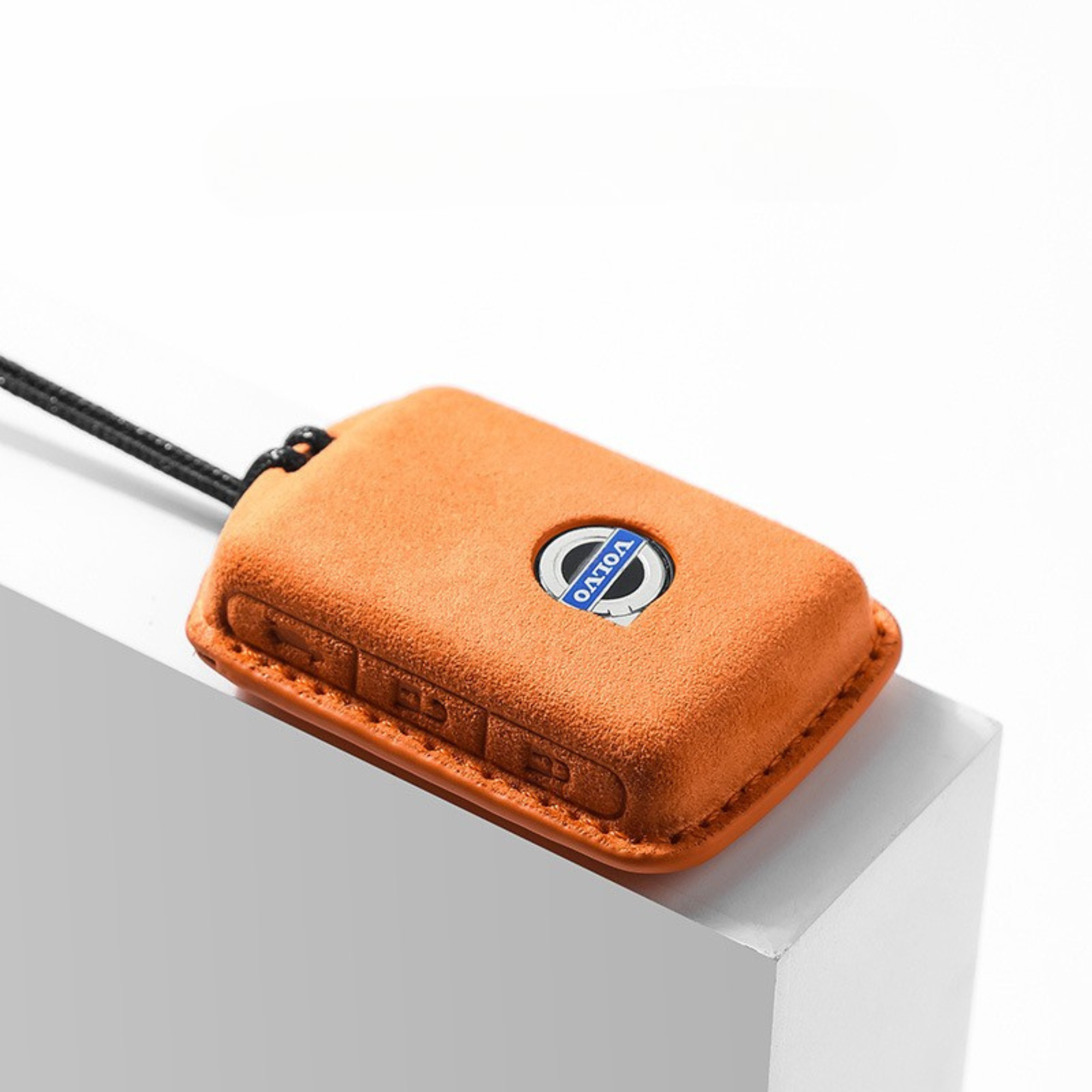 Orange Alcantara Volvo key cover – luxury look and grip

