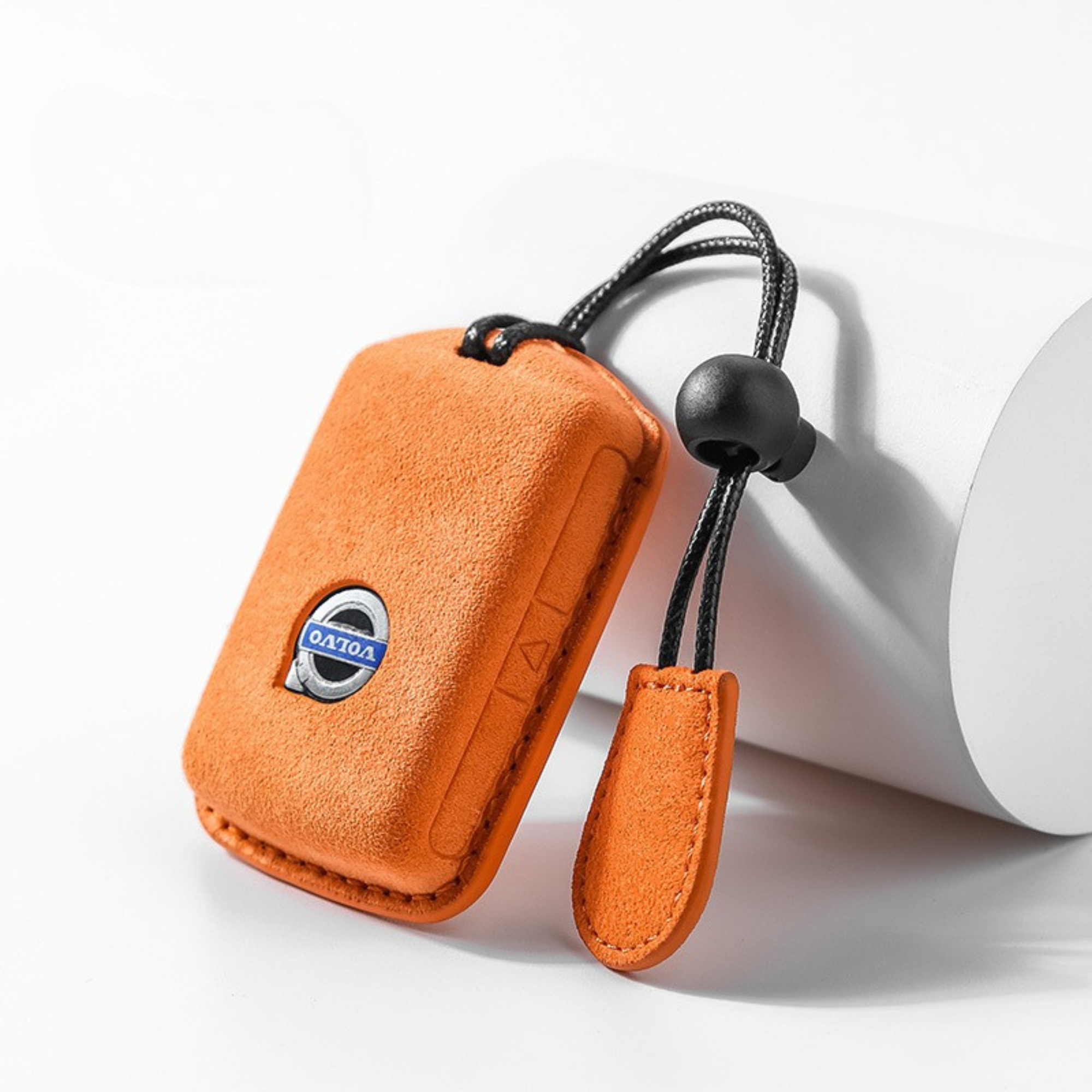 Orange Alcantara Volvo smart key case – soft-touch finish

